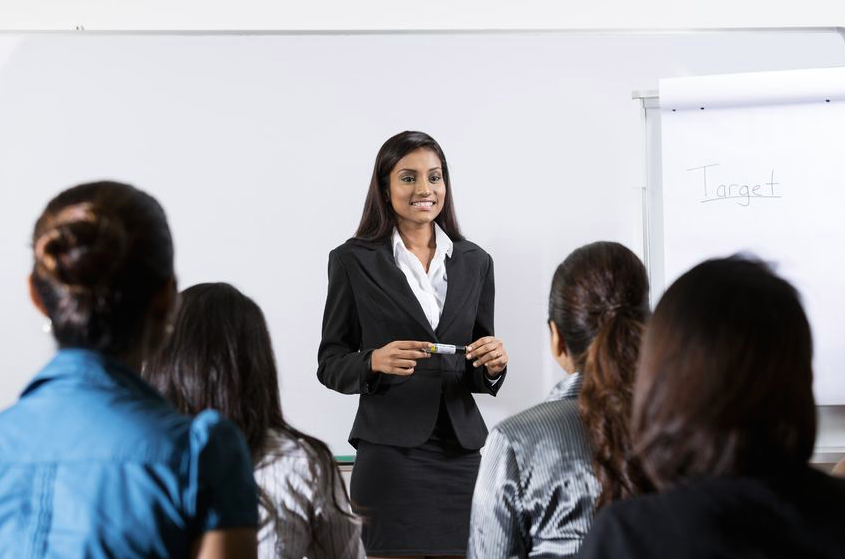 Image result for woman presenting work